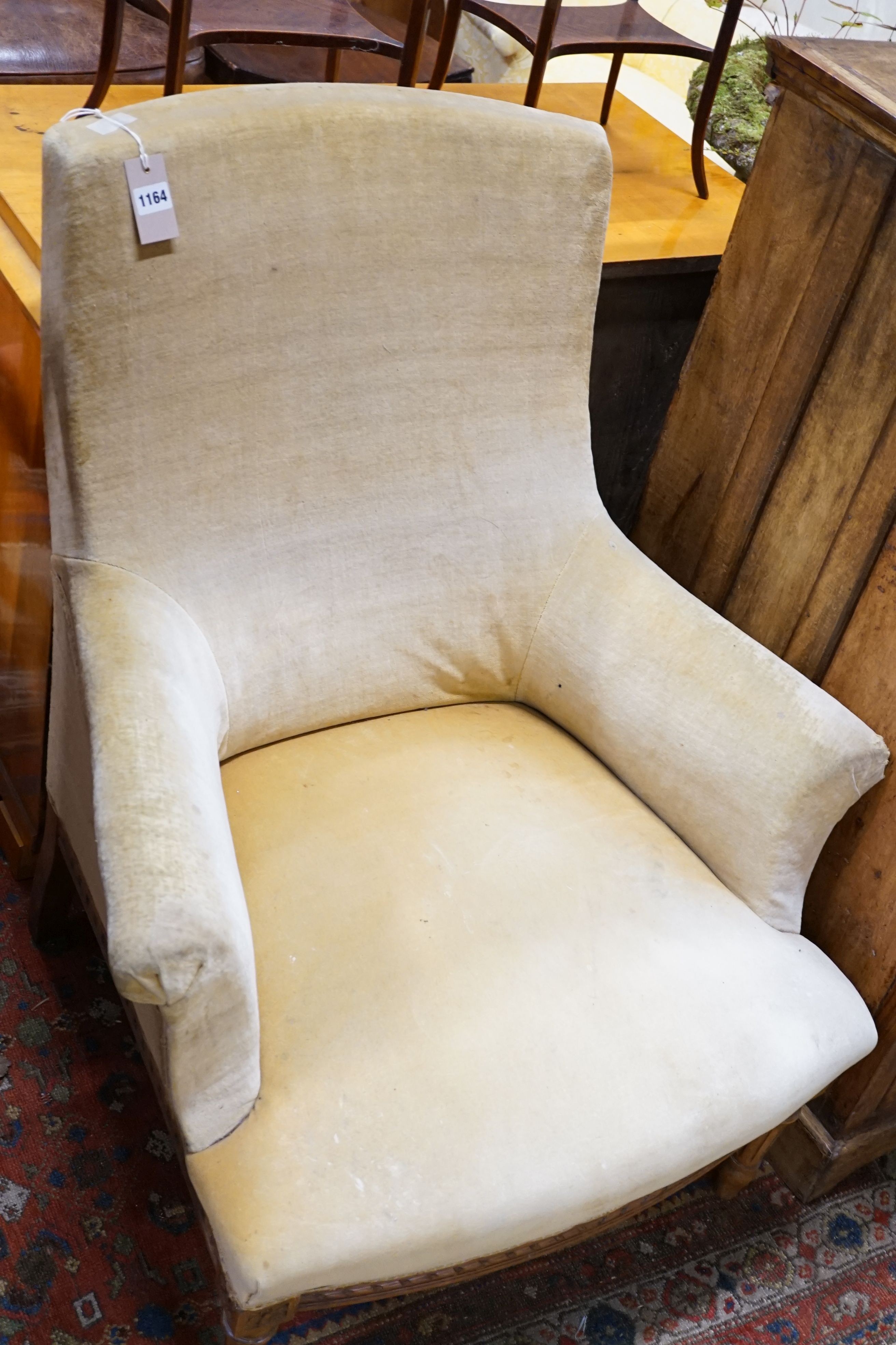 A late 19th century French carved beech armchair